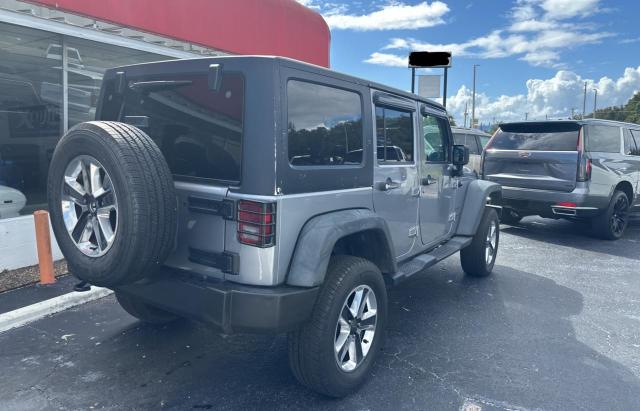 1C4HJWDG6EL251587 - 2014 JEEP WRANGLER U SPORT GRAY photo 4