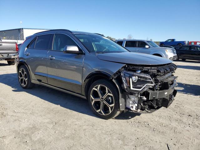 KNDCR3LE4P5061389 - 2023 KIA NIRO EX SILVER photo 4