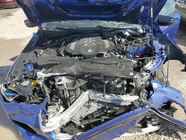 WBAGV8C08PCK41272 - 2023 BMW M850XI BLUE photo 11