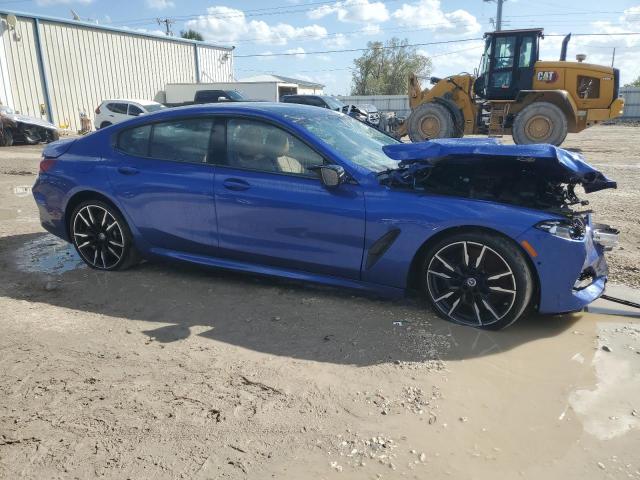 WBAGV8C08PCK41272 - 2023 BMW M850XI BLUE photo 4
