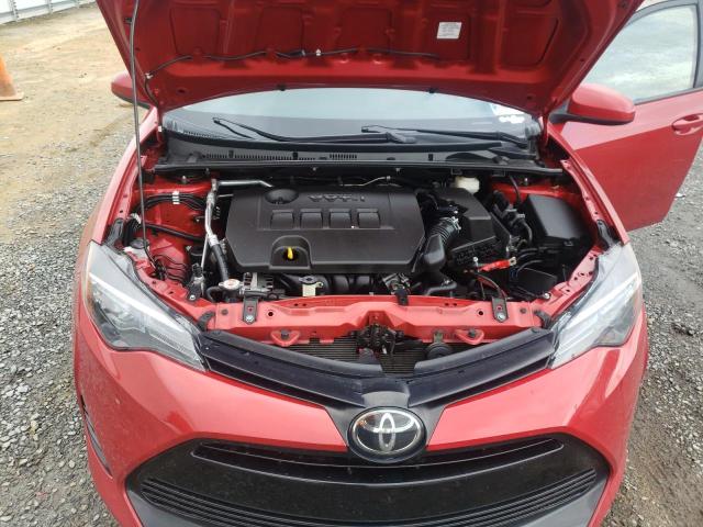 5YFBURHE8KP863168 - 2019 TOYOTA COROLLA L RED photo 11