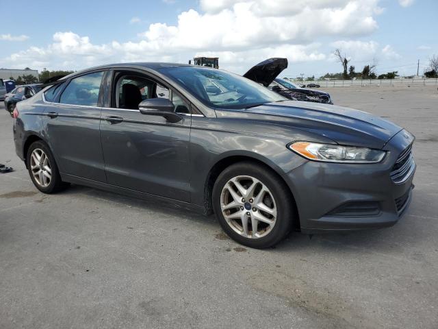 3FA6P0H77FR167199 - 2015 FORD FUSION SE GRAY photo 4