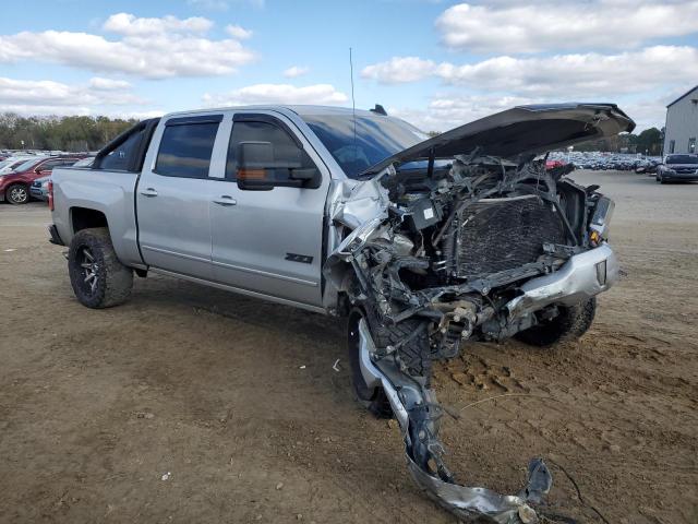 3GCUKREC7GG103604 - 2016 CHEVROLET SILVERADO K1500 LT SILVER photo 4