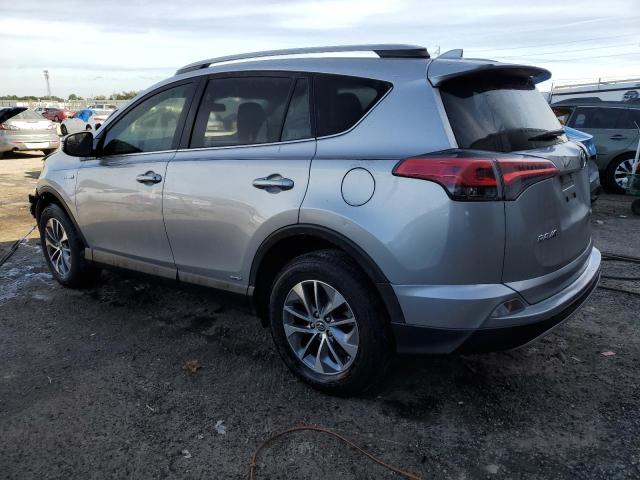 JTMRJREV2JD253747 - 2018 TOYOTA RAV4 HV LE SILVER photo 2