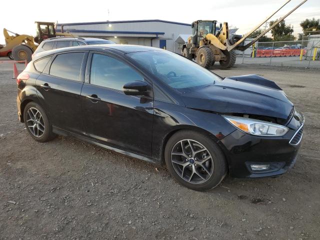 1FADP3K21GL212868 - 2016 FORD FOCUS SE BLACK photo 4