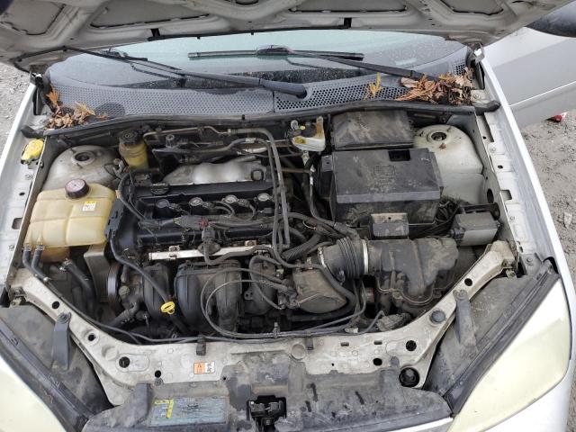 1FAFP34N75W143177 - 2005 FORD FOCUS ZX4 SILVER photo 11