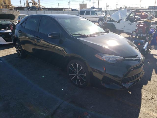 5YFBURHEXJP829893 - 2018 TOYOTA COROLLA L BLACK photo 4