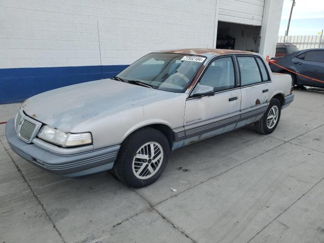 1G2NE54U6KC717199 - 1989 PONTIAC GRAND AM LE ტურკოუსი ფოტო 1