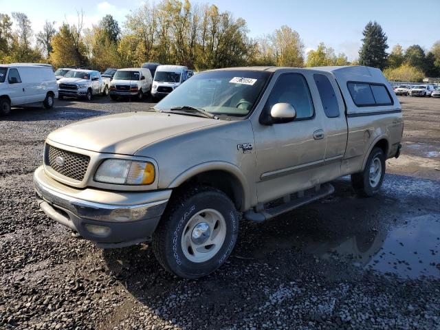 2FTRX18L6YCB10126 - 2000 FORD F150 Алтын фото 1