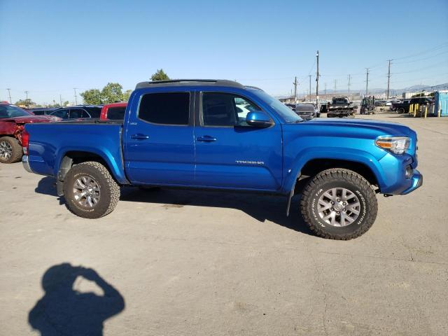 3TMAZ5CN4GM021083 - 2016 TOYOTA TACOMA DOUBLE CAB BLUE photo 4