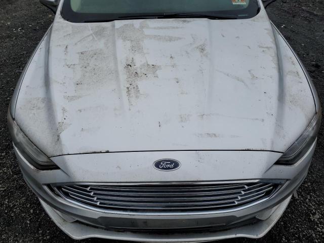 3FA6P0LUXHR385914 - 2017 FORD FUSION SE HYBRID SILVER photo 11