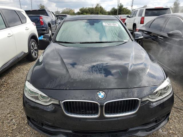 WBA8E1G54JNU90469 - 2018 BMW 320 I BLACK photo 5