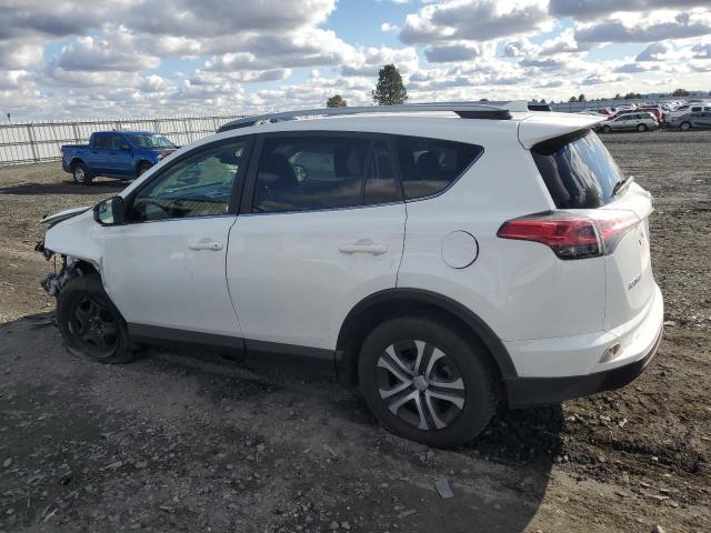 JTMBFREV7HJ158812 - 2017 TOYOTA RAV4 LE WHITE photo 2