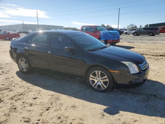 3FAHP07Z87R221803 - 2007 FORD FUSION SE BLACK photo 4