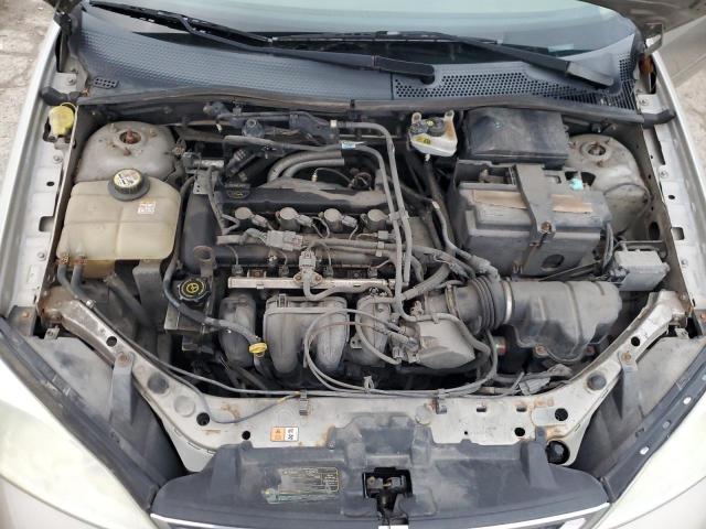 1FAHP34N17W162321 - 2007 FORD FOCUS ZX4 BEIGE photo 11