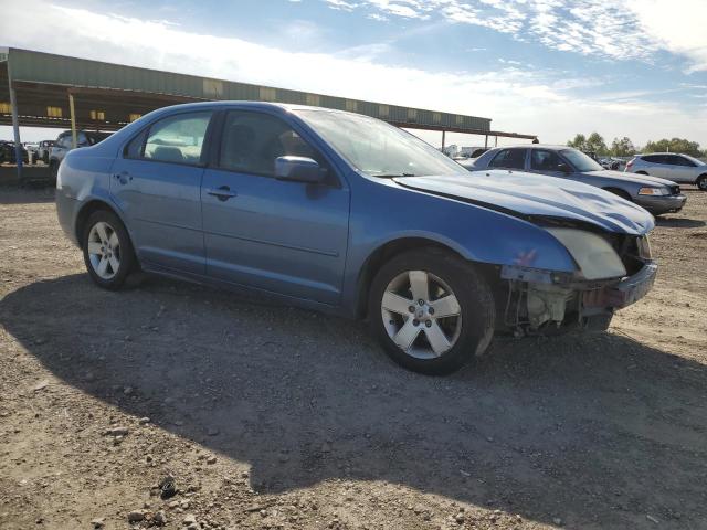 3FAHP07Z09R123111 - 2009 FORD FUSION SE BLUE photo 4