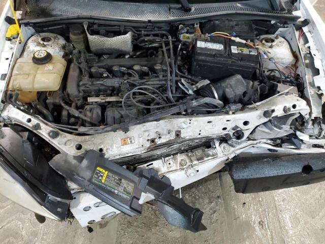 1FAFP34N85W224382 - 2005 FORD FOCUS ZX4 WHITE photo 11