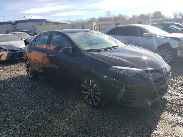 5YFBURHE2HP641881 - 2017 TOYOTA COROLLA L BLACK photo 4