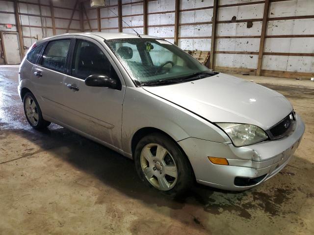 1FAHP37N97W345784 - 2007 FORD FOCUS ZX5 SILVER photo 4