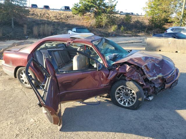 2G4WF5516Y1270238 - 2000 BUICK REGAL GS Марун фото 4