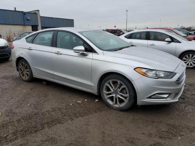 3FA6P0HD1HR189725 - 2017 FORD FUSION SE SILVER photo 4