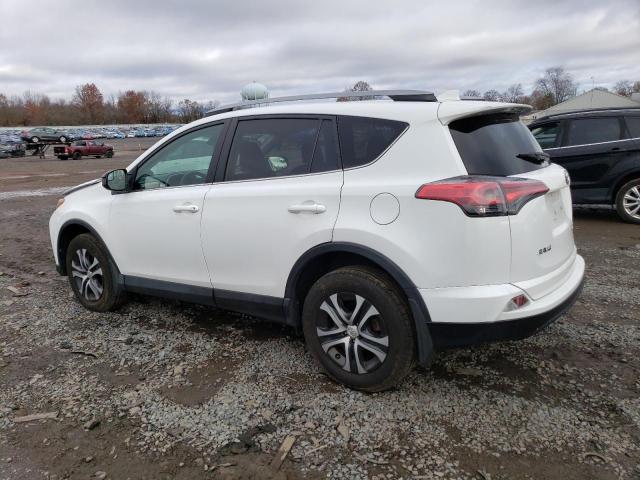 2T3BFREV9JW770355 - 2018 TOYOTA RAV4 LE WHITE photo 2