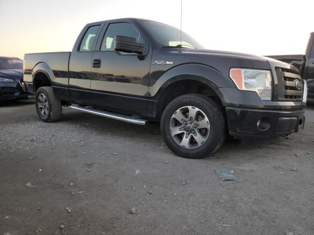 1FTEX1CM7BFA47578 - 2011 FORD F 150 SUPER CAB BLACK photo 4