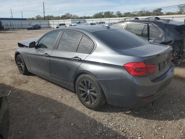 WBA8A9C52JAH14798 - 2018 BMW 320 I GRAY photo 2