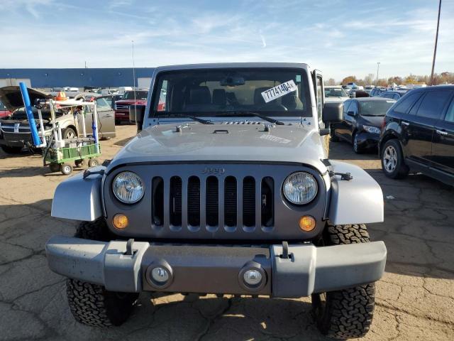 1C4AJWAGXGL167636 - 2016 JEEP WRANGLER SPORT SILVER photo 5