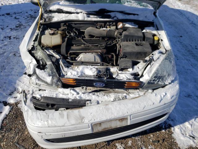 1FAFP34374W194093 - 2004 FORD FOCUS SE COMFORT WHITE photo 11