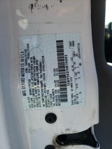 1FAFP34374W194093 - 2004 FORD FOCUS SE COMFORT WHITE photo 12