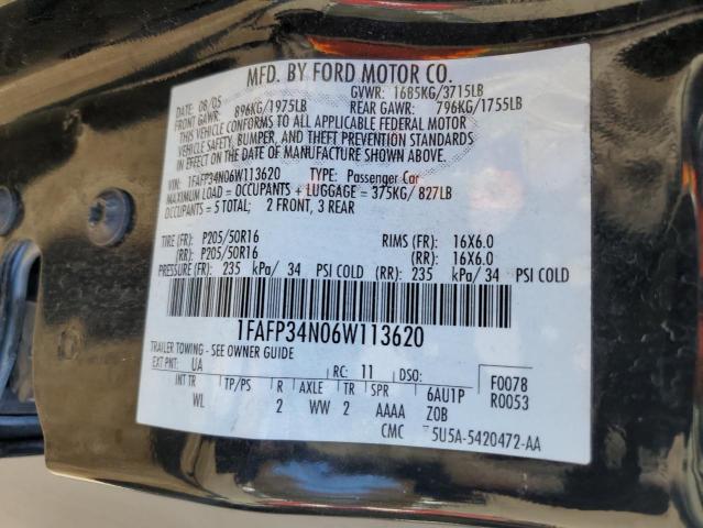 1FAFP34N06W113620 - 2006 FORD FOCUS ZX4 BLACK photo 12