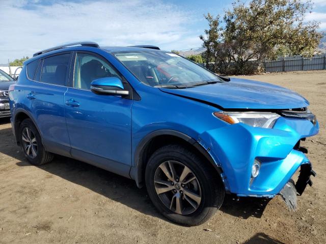 JTMWFREV5JJ154099 - 2018 TOYOTA RAV4 ADVENTURE BLUE photo 4