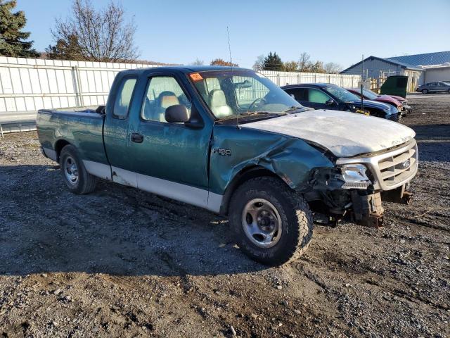 1FTZX1724WNB89957 - 1998 FORD F-150 GREEN photo 4