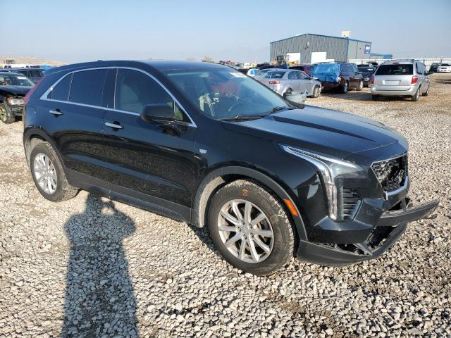 1GYFZBR47KF221669 - 2019 CADILLAC XT4 LUXURY BLACK photo 4