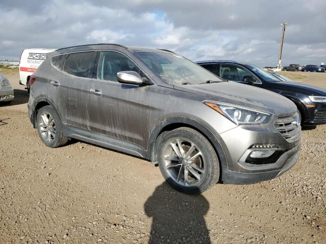 5XYZUDLA1HG433310 - 2017 HYUNDAI SANTA FE S GRAY photo 4