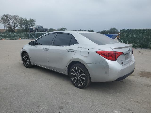 5YFBURHE0HP659781 - 2017 TOYOTA COROLLA L SILVER photo 2