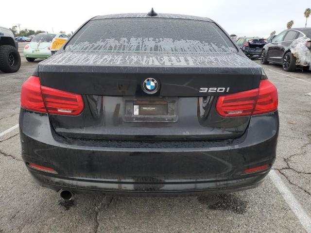 WBA8A9C54JK623099 - 2018 BMW 320 I BLACK photo 6