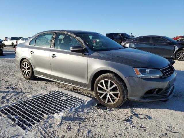 3VWDB7AJ1HM309400 - 2017 VOLKSWAGEN JETTA SE GRAY photo 4