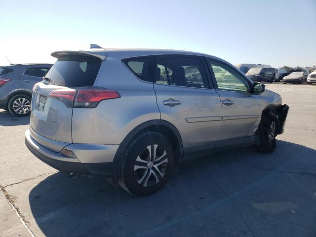 JTMZFREV5JJ183597 - 2018 TOYOTA RAV4 LE SILVER photo 3