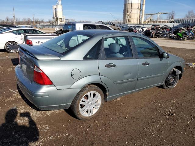 1FAHP34N85W266205 - 2005 FORD FOCUS ZX4 BLUE photo 3