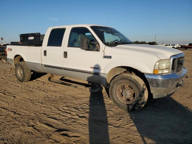 1FTSW31PX4EA44472 - 2004 FORD F350 SRW SUPER DUTY WHITE photo 4