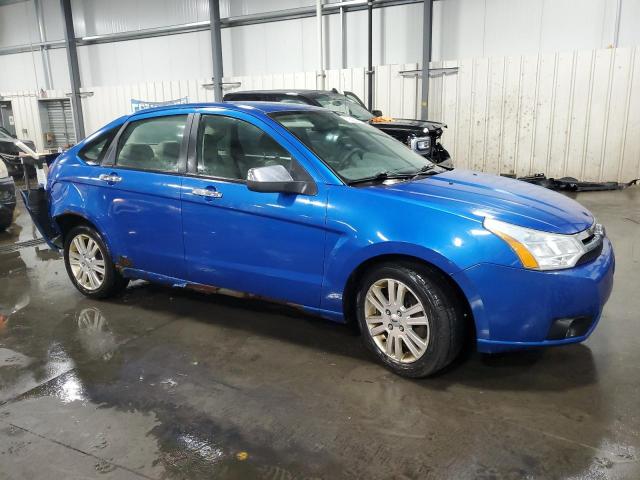 1FAHP3HN1AW148694 - 2010 FORD FOCUS SEL BLUE photo 4