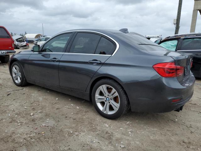 WBA8B9C53JAE21988 - 2018 BMW 330 I GRAY photo 2