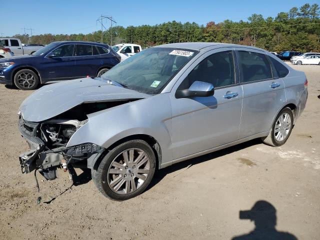 1FAHP3HN5AW166566 - 2010 FORD FOCUS SEL SILVER photo 1