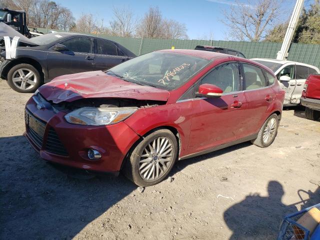 1FAHP3M2XCL243898 - 2012 FORD FOCUS SEL RED photo 1