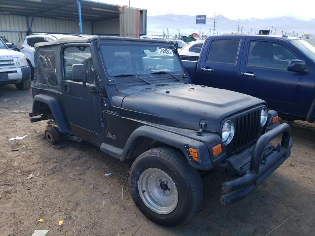 1J4FA29P31P311394 - 2001 JEEP WRANGLER / SE BLACK photo 4