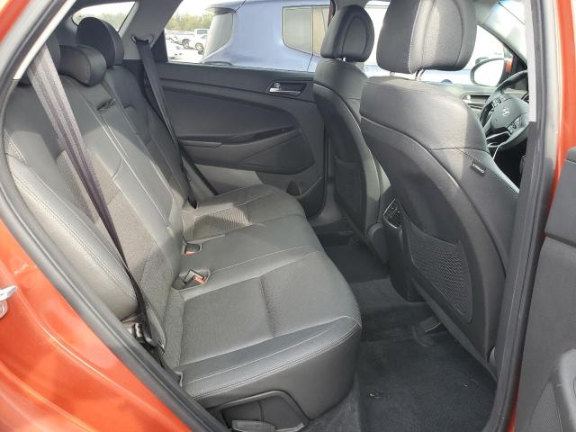 KM8J33A2XGU229944 - 2016 HYUNDAI TUCSON LIMITED ORANGE photo 10