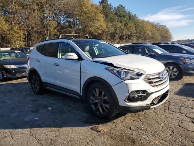 5XYZW4LA9HG491952 - 2017 HYUNDAI SANTA FE S WHITE photo 4