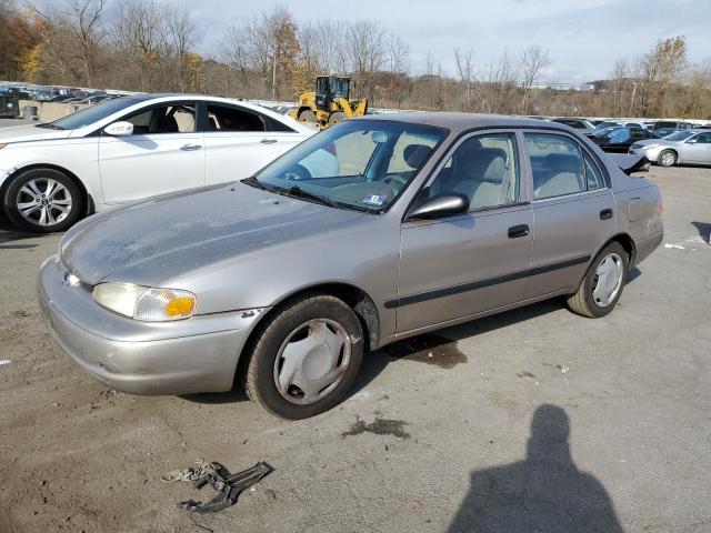 1Y1SK5484XZ401262 - 1999 CHEVROLET GEO PRIZM BASE TAN photo 1